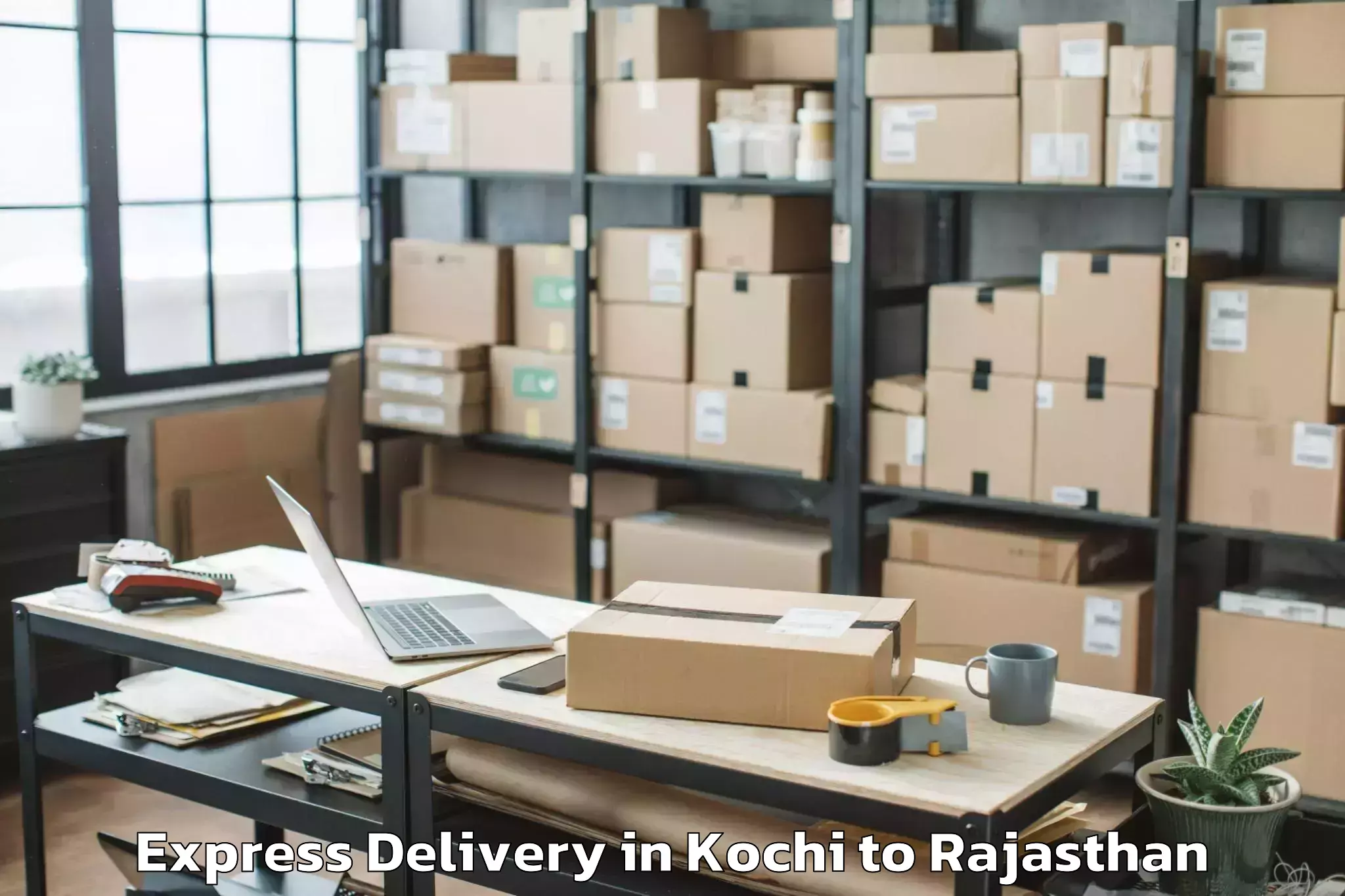 Get Kochi to Sheoganj Express Delivery